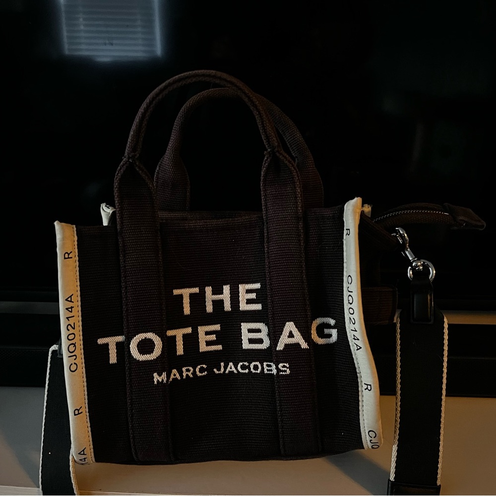 Marc Jacobs The Tote Bag. Faded. See pics. Strap does not come with this.